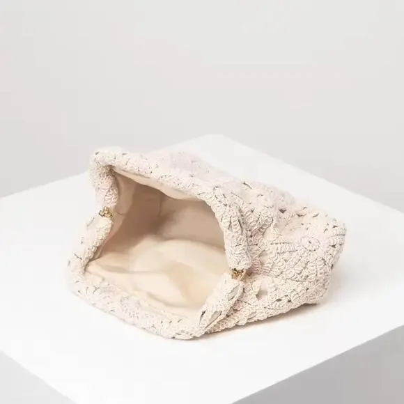 Cream textured clutch bag - Picture 1 of 7